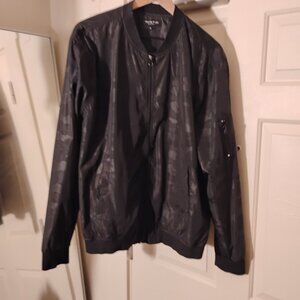 Camo black bomber style jacket. Wind breaker.